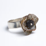 Marianne Willumsen | Ring with Mokume-gane shapes and beach pebble