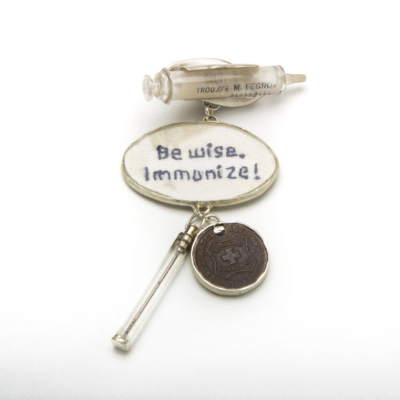 Statemeant2020 sterling silver, vintage snakebite kit, hand embroidered wool, canine vaccination tag