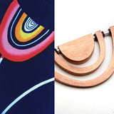 Fredia Flowers - Yukata Jewelry show copper silver stylized tulip necklace on leather cord